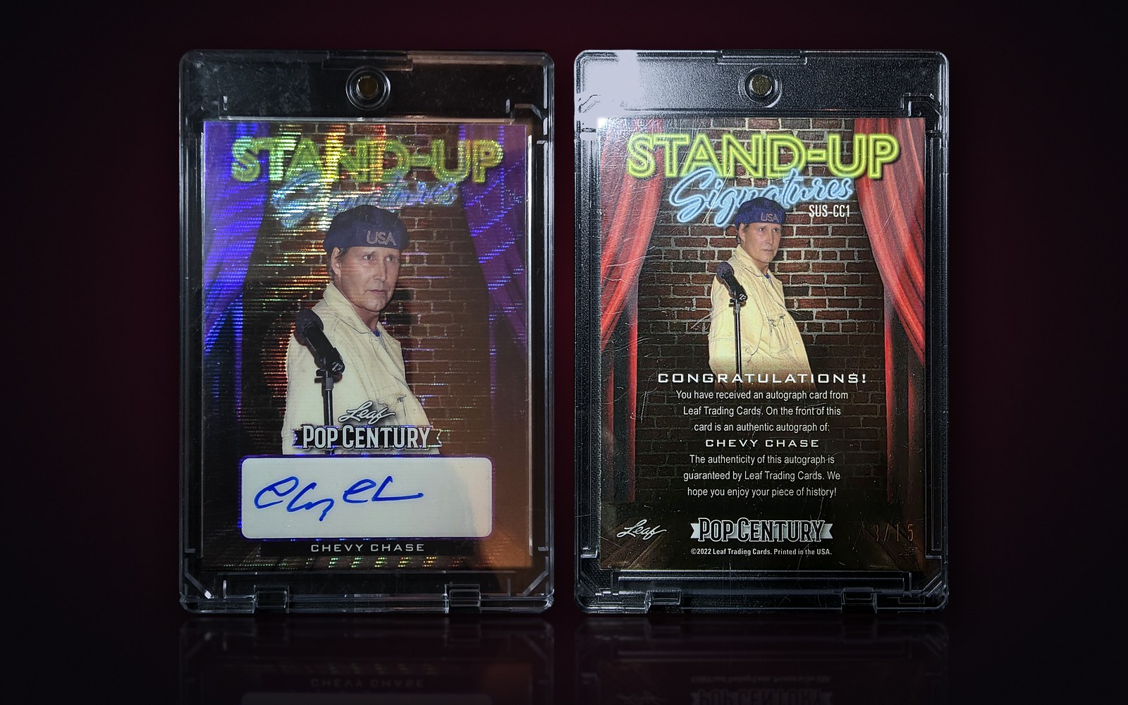 Front and back of the 2022 Leaf Metal Pop Century Stand-Up Signatures Chevy Chase autograph card in a magnetic holder