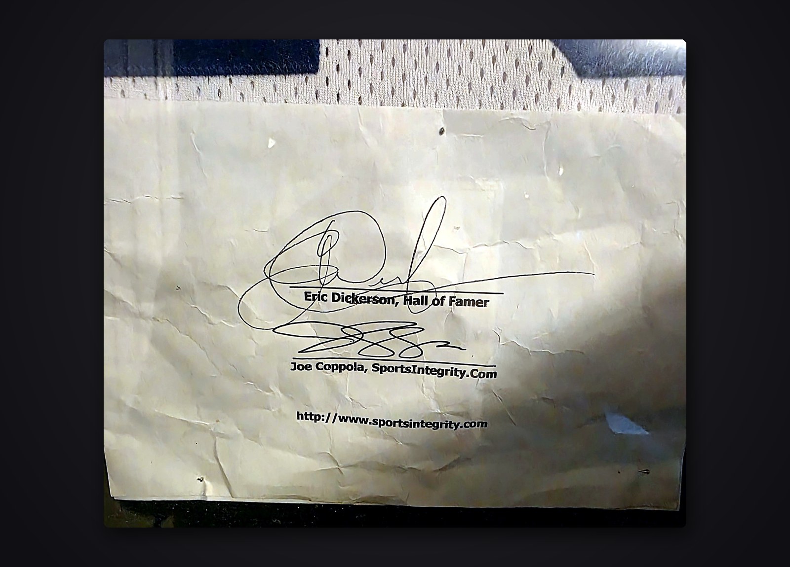 Certificate signed by Eric Dickerson and Joe Coppola of SportsIntegrity.com
