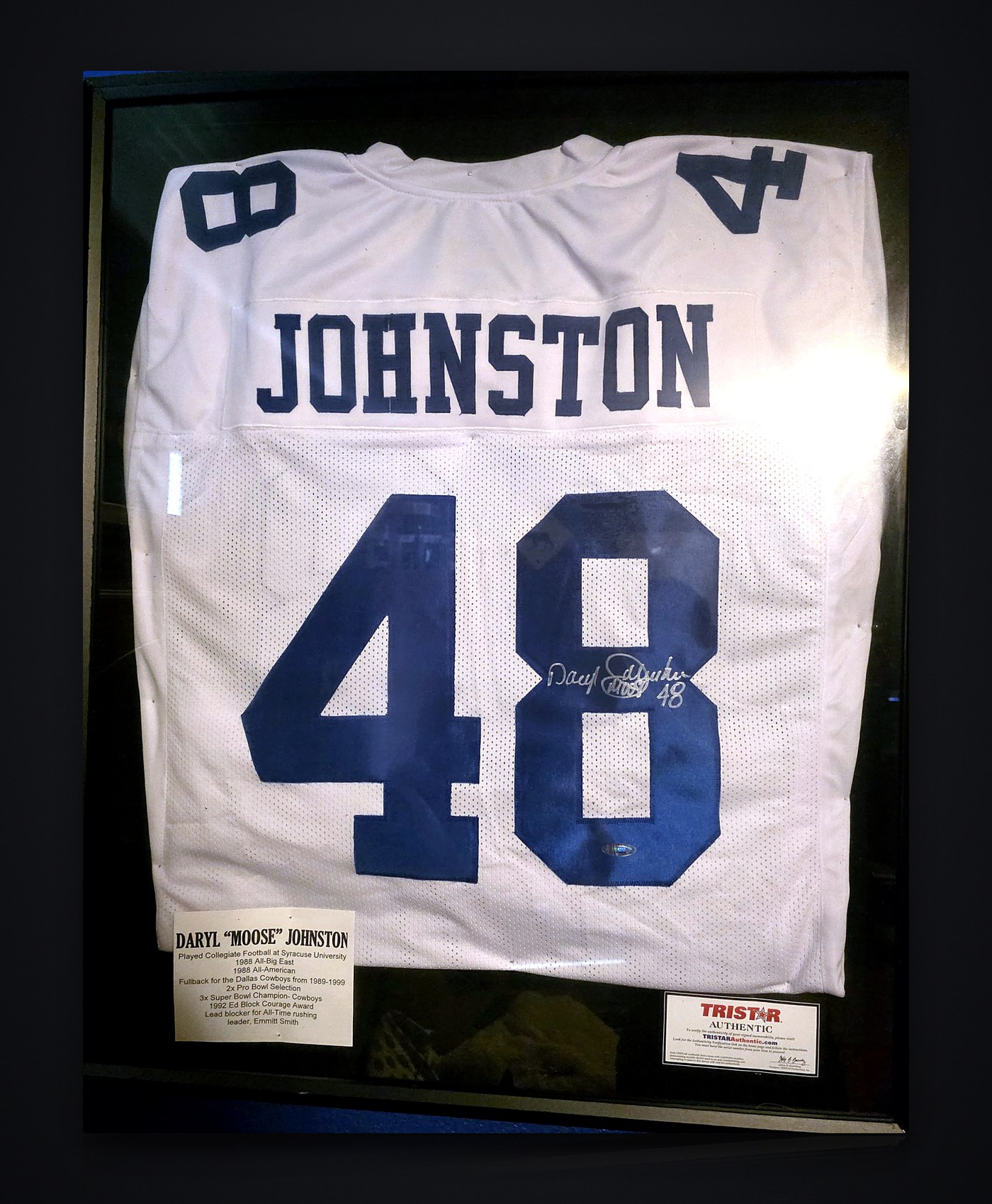 Framed white Dallas Cowboys #48 Johnston jersey signed in silver