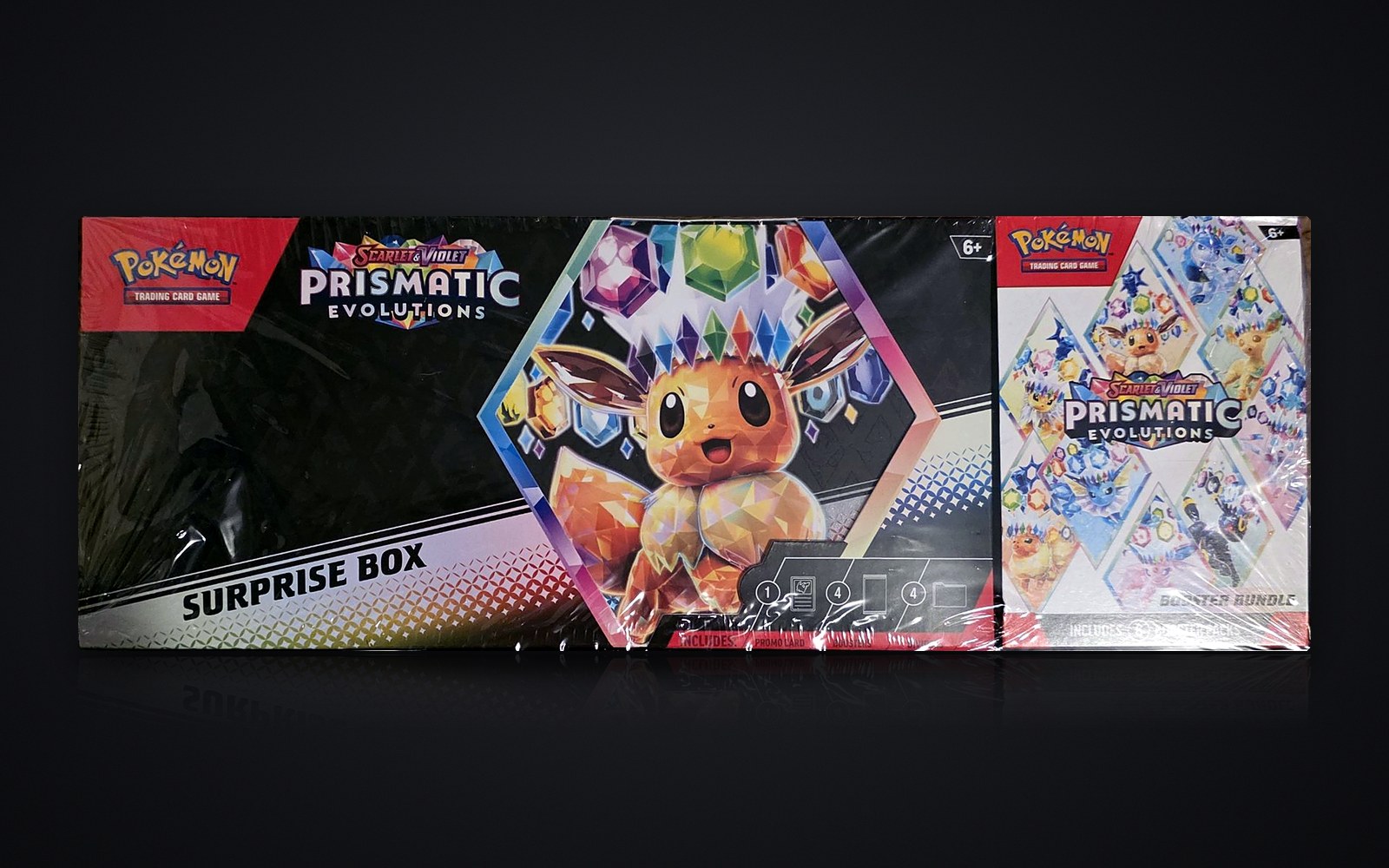 Pokémon Prismatic Evolutions Surprise Box + Booster Bundle, sealed