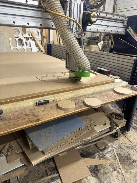CNC router cutting MDF baffle rings