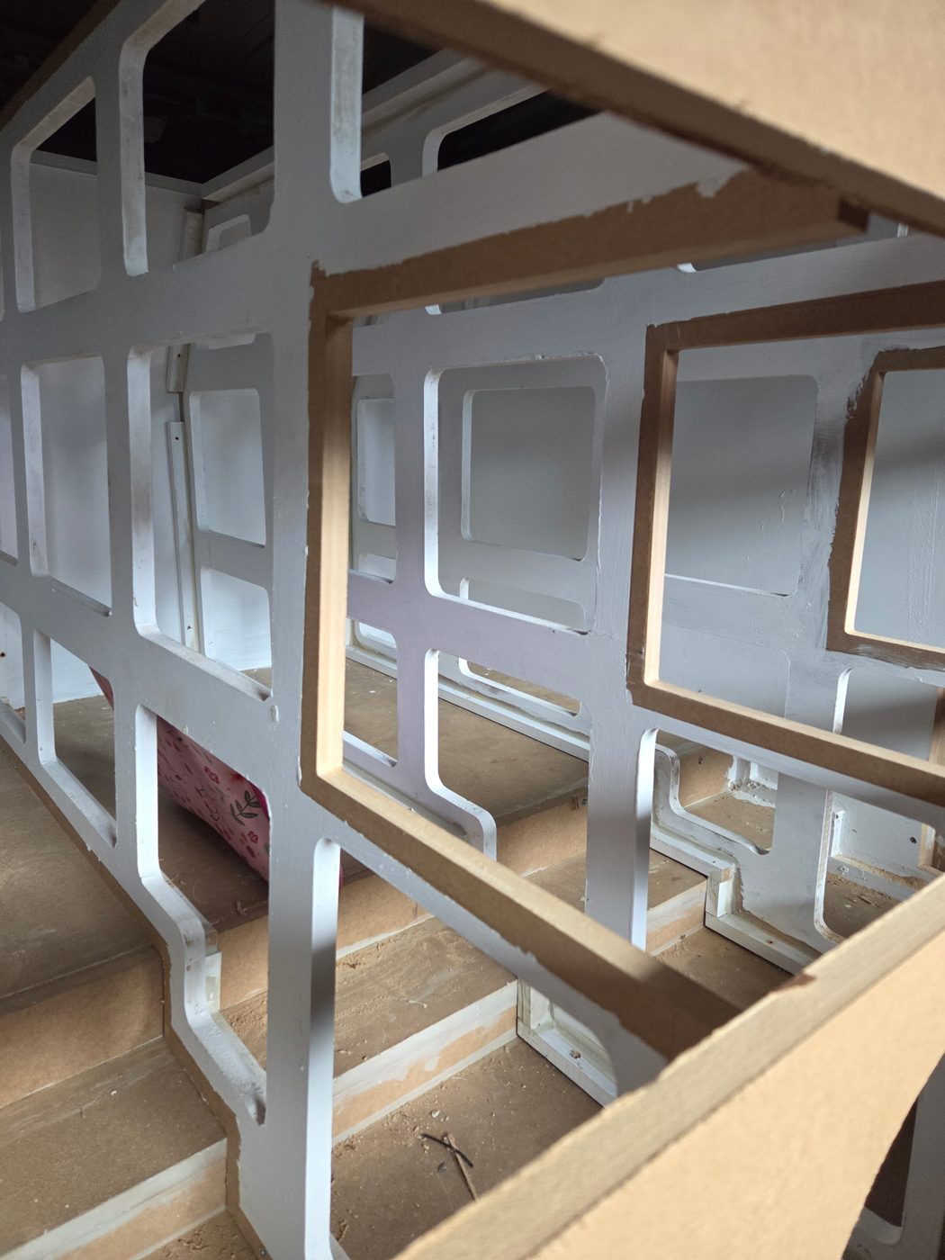 White painted internal bracing inside the subwoofer wall